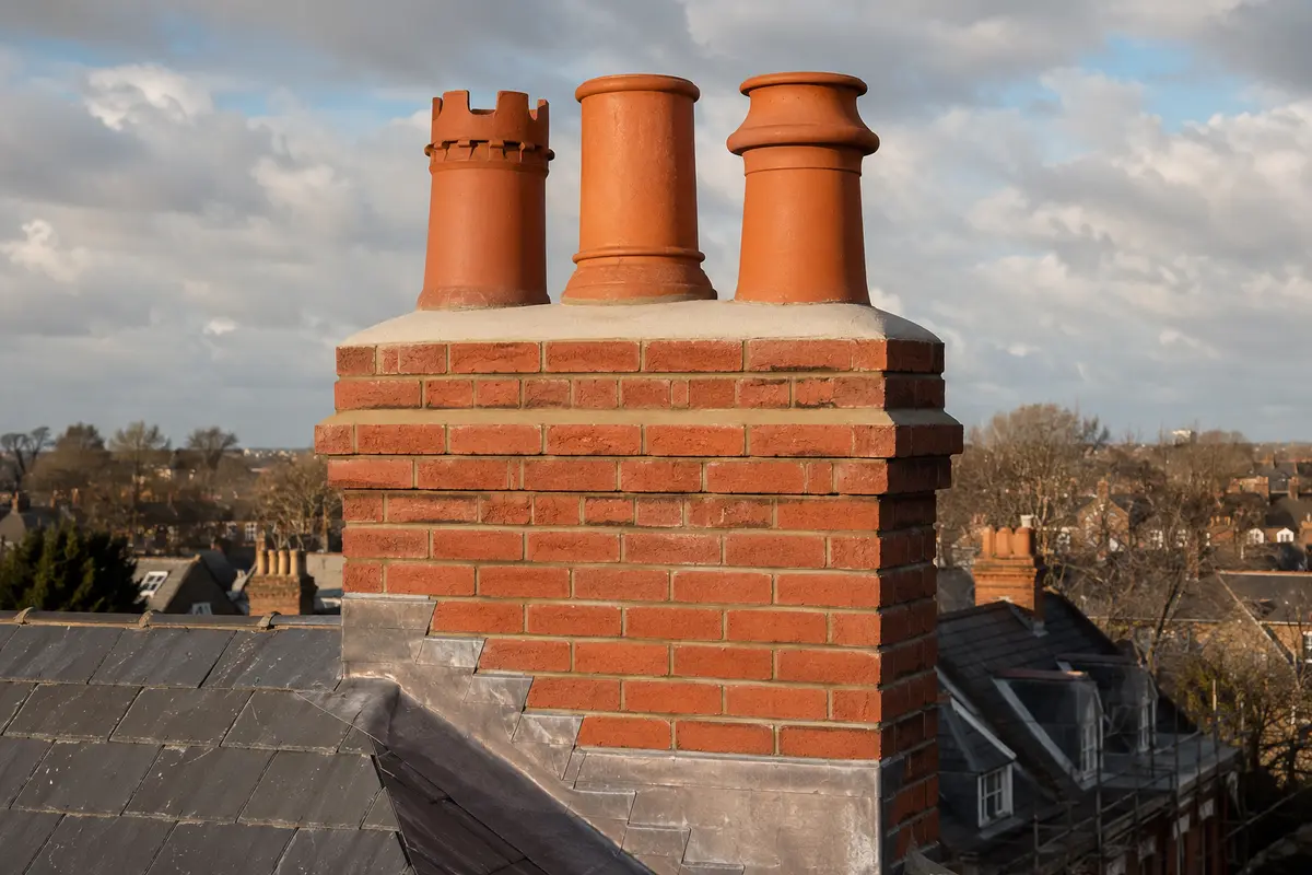 Restored chimney pots, flaunching and leadwork